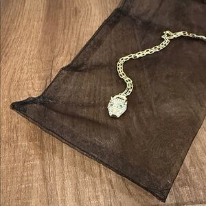 Elegant Gold Panther Necklace with Green Accents